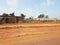 Poor streets of Bamako, Mali with red Arican soil