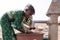 Poor West Africa Youngster with pure Water in a rural village