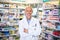 Pop around for trusted medical advice. Portrait of a mature pharmacist working in a chemist.