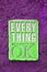 Pop art style neon green signboard of EVERYTHING is going to be OK on the rough vivid purple wall
