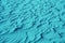 Pop art surreal style turquoise blue colored desert sand ripple patterns