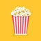 Pop corn isolated on yellowe background.