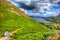 Pop top campervan The Lake District UK with view of british countryside in HDR