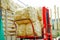 POPAYAN, COLOMBIA - FEBRUARY 06, 2018: Close up of red truck full of hay straw bales, ready for transportation, located