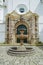 POPAYAN, COLOMBIA - FEBRUARY 06, 2018: Outdoor view of stoned fountain in front of Santo Domingo church in colonial city