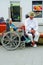 POPAYAN, COLOMBIA - FEBRUARY 06, 2018: Outdoor view of unidentified people in the streets, woman in wheel chair and man