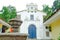 POPAYAN, COLOMBIA - FEBRUARY 06, 2018: Outdoor view of white small cathedral with a stoned fountain in Popayan town