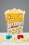 Popcorn bucket overflowing and 3d glasses