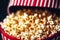 Popcorn in a cup on a wooden background. Generative AI