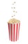 Popcorn falling into a classic striped bucket