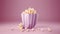 Popcorn for movie, cinema. Popcorn in pink bucket isolated on purple background. Banner pop corn salty cheese fast food snack