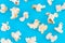 Popcorn pattern on blue  background. Top view