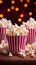 Popcorn perfection on a pink cinema  themed table, inviting front  view indulgence