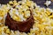 Popcorn popcorn on wood textured background closeup macro