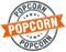 popcorn round orange grungy isolated stamp