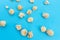 Popcorn scattered on blue background
