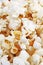 Popcorn texture. Popcorn snacks as background. Stack pile popcorn pattern.