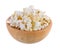 Popcorn in wood bowl isolated