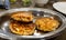 poppy fried cake, posto bora, indian snack starter bengali thali