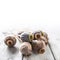 Poppy heads freely lying on a wooden board