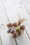 Poppy heads freely lying on a wooden board