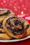 Poppy seed buns on cake stand. Christmas eve setting