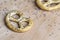 Poppy seed coating dried bagels on the table