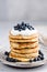 Poppy Seed Pancakes Served With Greek Yogurt And Blueberries