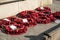 Poppy wreaths laid at the foot of the war memorial