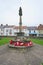 Poppy wreaths on war memorial