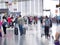 Popular airport flights are popular. And there are many people to use the service. This image is blurry