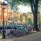 Popular bicycles in Europe. Many bicycles are parked on the street and traditional old European houses. Amsterdam, Netherlands,