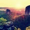 Popular climbers resort in Saxony park, Germany. Sharp sandstone cliffs above deep valley.