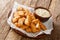 Popular Dutch street food Kibbeling item consisting of pieces of cod fish that are dipped in batter, deep-fried  and served with a