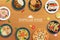 Popular food on a wooden background.