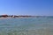 Popular free beach full of bathers in Salento, Apulia