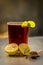 Popular Indian/Asian summer drink Kala Khatta Sharbat with garnishing ingredients i.e. sliced lemon,Citrus Ã— limon, salt,sodium