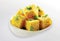 popular Indian Gujarati dish  Traditional Street Food  Sev Khaman Dhokla  Served With Chutney or Chilly. selective focus - Image