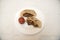 Popular Israeli dish - falafel in a plate on a white tablecloth