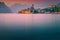 Popular Malcesine tourist resort at colorful sunset, Garda lake, Italy