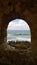 A popular site for photography in Chania - a beautiful hollow window in the destroyed old wall on the shore in Chania Crete