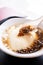 Popular Taiwan gourmet - Dessert of tapioca pearl ball bubble mixed bean curd tofu pudding douhua, dou hua in white bowl,