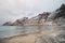 Popular tourist beach Ersfjord on Senja Island in northern Norway above the Arctic Circle. A sandy beach surrounded by snow-capped