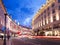 Popular tourist Regent street with flags union jack at night