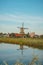 Popular tourist spot Zaanse Schans is near Amsterdam in the west of the Netherlands. Historical, realistic windmills during