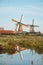 Popular tourist spot Zaanse Schans is near Amsterdam in the west of the Netherlands. Historical, realistic windmills during