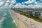 Popular vacation spot in the United States. Ocean warm waters and sandy beachfront at Miami Beach in Florida, USA