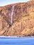 Popular waterfall in Talisker bay, Scotland. Popular destination