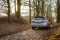 Poratz, Brandenburg, Germany - march 11, 2018: a Mazda car on a small street leading through a forest