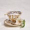 Porcelain antique tea cup and saucer with flower